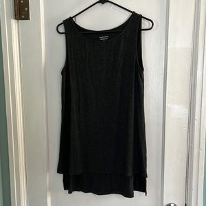 Long dark gray sleeveless shirt.